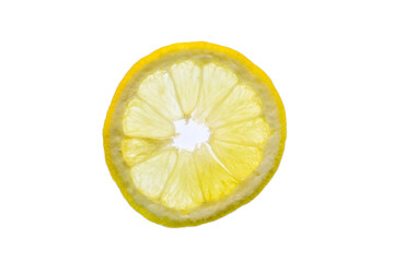 A fresh lemon slice on white