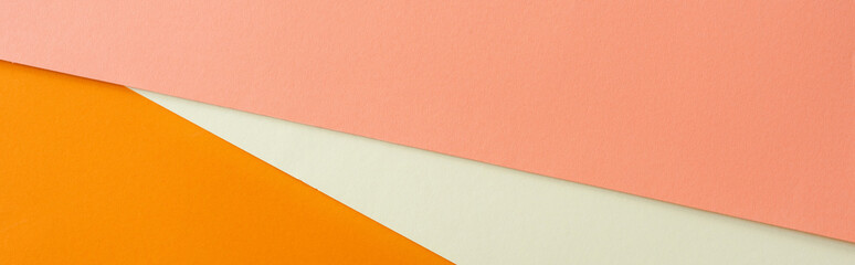 abstract geometric background with white, pink and orange bright paper, panoramic shot