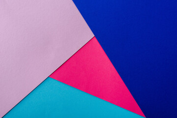 abstract geometric background with pink, blue and violet paper