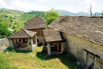 Fototapeta na wymiar The monastery of Saint Nicolaos at the entrance of Skamneli village, one of the 45 villages known as Zagoria or Zagorochoria in Epirus region of southwestern Greece.