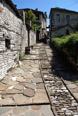 The stone-made footwalk at the square of Dilofo village, Zagoria area, Ioannina Prefecture, Epirus region, north-western Greece, August 8 2010.