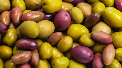 Tasty mix olives background.