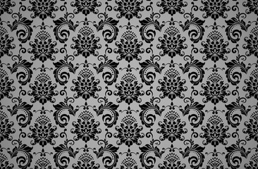 Wallpaper in the style of Baroque. Seamless vector background. Black and gray floral ornament. Graphic pattern for fabric, wallpaper, packaging. Ornate Damask flower ornament