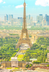 Obraz premium vertical frame cityscape of Paris with Eiffel Tower on background. Seasonal picturesque background in spring. Scenic wallpaper with Eiffel Tower. Vertical shot.