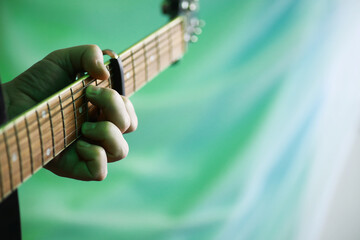 An acoustic guitar for an artist playing a stringed musical instrument on stage. Black guitar with...