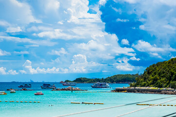 Chon Buri, Thailand - June, 27, 2020 :  Pictures of Unidentified name people on Tawaen Beach in the day time on Koh Lan island after the outbreak of the Covid 19 virus.