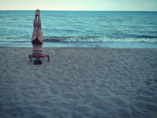 inverted female figure and the sea