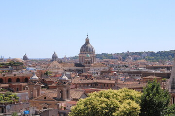 Fototapeta na wymiar Rooftop view of Rome city Center italy Rome is historical city tourist attraction with many beautiful landmarks