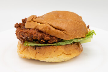 Generic Fried Chicken Sandwich on a White Plate