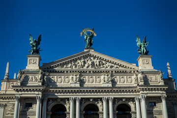 Fototapeta na wymiar different big sculptures adorn front of national opera and ballet theatre in Lviv