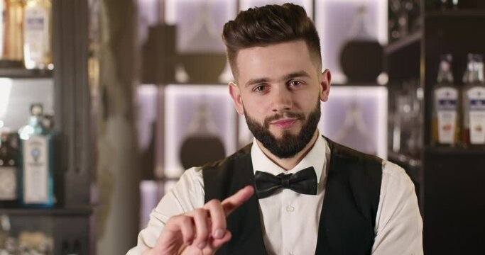 The bartender is saying "no" and waving his finger. 4K
