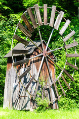 Old wooden windmill in heriatege park, Krosno, Poland