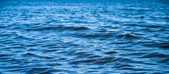 Blue sea surface for background. Selective focus.