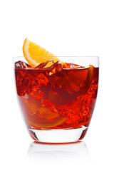 Negroni Cocktail in luxury crystal glass with ice cubes and orange slices on white background with reflection.