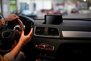 Fototapeta premium Template for Mobile phone magnet car mount phone holder, for GPS. Lifestyles photo in car. Interior, front view. With woman hand holding phone. Different angels.