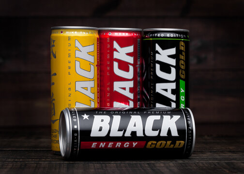 LONDON, UK - JANUARY 24, 2018: Aluminium cans of Black Energy Drink on wood.Leader on the energy market in Poland