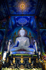 Obraz premium Wat Rong Suea Ten or The Blue Temple translates as House of the dancing tiger. A monumental, modern Buddhist temple distinguished by its vivid blue coloring & elaborate carvings in Chiang Rai Province