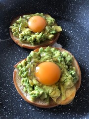 fried eggs in a frying pan