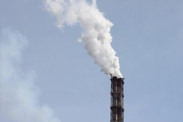 Production pipe with white smoke. Air emissions, environmental pollution. Concept ecology.