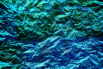 Holographic iridescent modern abstract crinkled foil background