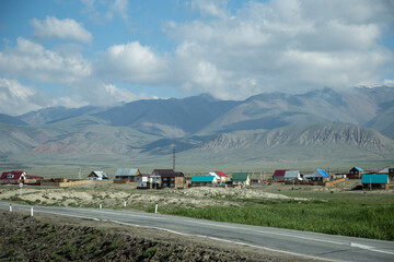 Traveling in the Altai Republic. The plot of the Chuysky tract. The city of Kosh-Agach. Local Russian village with a national lifestyle