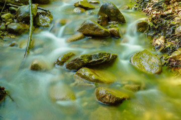 Rocks Surrounded by a River Long Exposure
