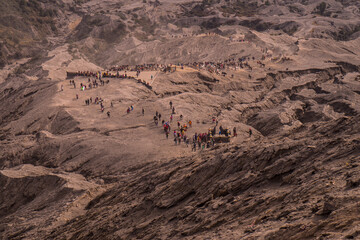 Fototapeta na wymiar High Angle View Of People Walking In Desert