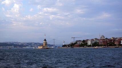 Fototapeta premium Watching Istanbul from the Passenger Ferry, Bosphorus bridge and Maiden's tower