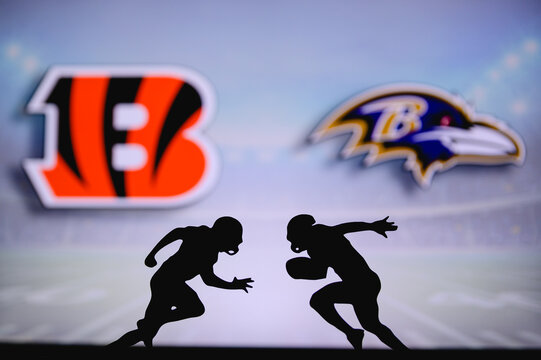 Cincinnati Bengals vs. Baltimore Ravens. NFL match poster. Two american football players silhouette facing each other on the field. Clubs logo in background. Rivalry concept photo.