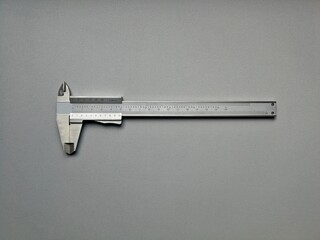 Steel caliper with metric and inch dials