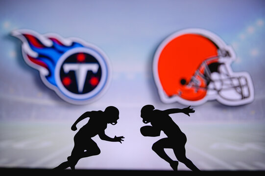 Tennessee Titans vs. Cleveland Browns. NFL match poster. Two american football players silhouette facing each other on the field. Clubs logo in background. Rivalry concept photo.