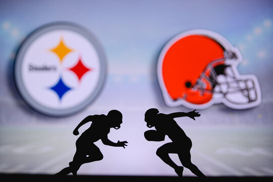 Pittsburgh Steelers vs. Cleveland Browns. NFL match poster. Two american football players silhouette facing each other on the field. Clubs logo in background. Rivalry concept photo.