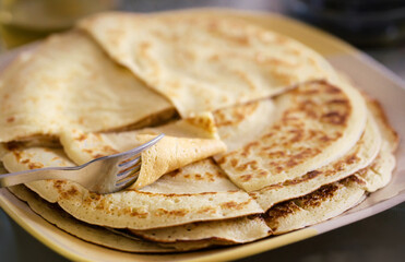 soft crepes prepared with eggs in the plate
