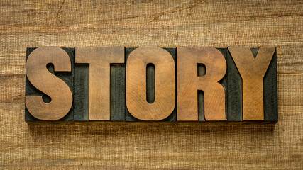 story word abstract in vintage letterpress wood type against handmade banana paper, news and narrative concept © MarekPhotoDesign.com