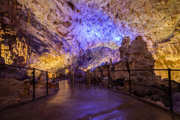 Postojna Cave in Slovenia iluminated with blue lighs
