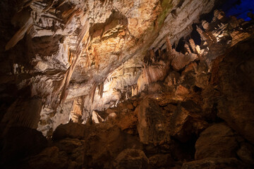 Postojna Cave in Slovenia iluminated with natural lighs