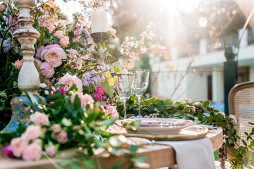 An elegant wedding table setting in the garden.