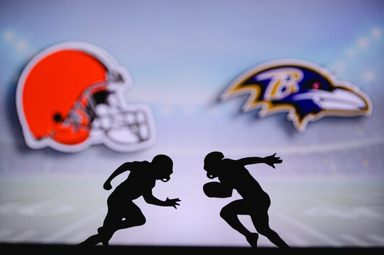 Cleveland Browns vs. Baltimore Ravens. NFL match poster. Two american football players silhouette facing each other on the field. Clubs logo in background. Rivalry concept photo.