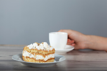 woman eat cake and drink coffee