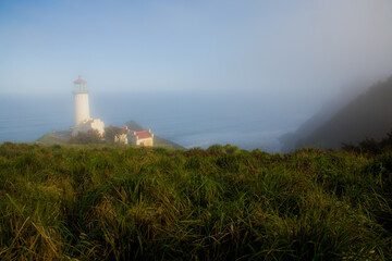 Fototapeta na wymiar North Head Lighthouse in the fog, on the south Washington coast at the mouth of the Columbia River.