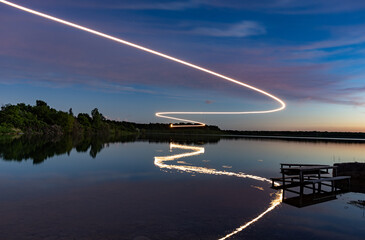 drone light painting over a lake