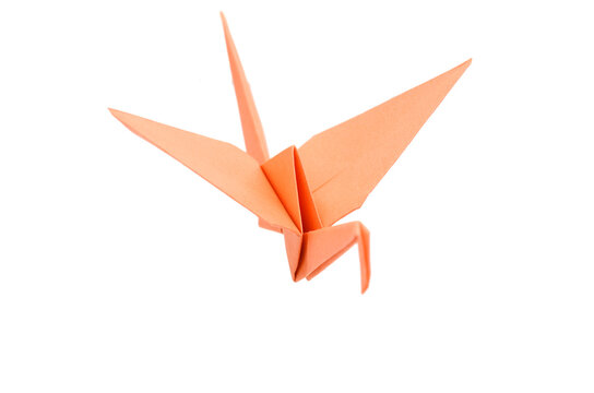 Origami crane on white background.