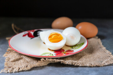 Boiled eggs are placed in a serving dish.