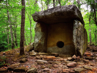 Dolmen in valley of the river Pshada. Ancient mysterious megalithic construction dolmen in Caucasus...