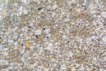 stones under the sea water background