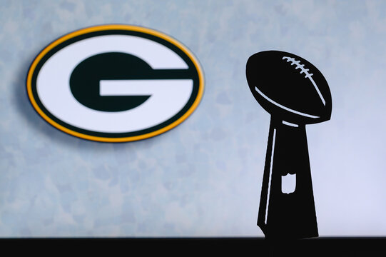 Green Bay Packers Professional American Football Club, Silhouette Of NFL Trophy, Logo Of The Club In Background.