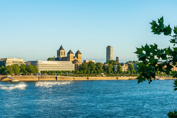 Fototapeta premium Catholic church Stankt Kunibert and the institute of the German economy in Cologne on the Rhine in the morning light