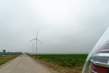 Wind turbines on a country road