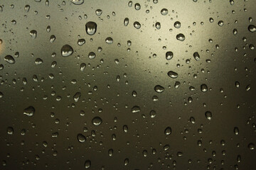 Raindrops on the glass. Raindrops on a sky background. Background. Texture.
