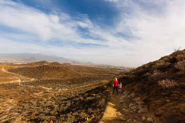 Fototapeta premium mother with little daughter travel in mountains tenerife